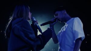 LO QUE ME CAUSA Lyrics - MILO J, TINI